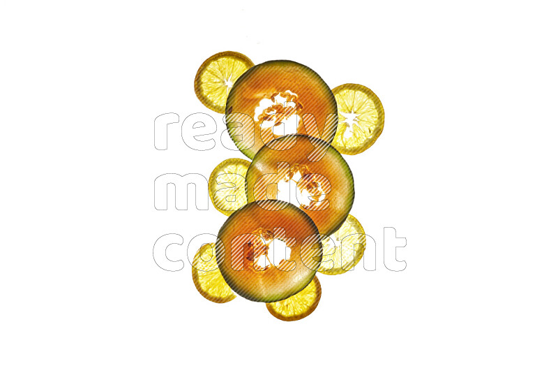 Mixed fruits slices on illuminated white background