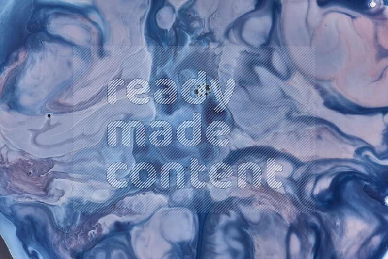 لقطة مقربة لأنماط دوامية باللون الأزرق والأحمر والأبيض