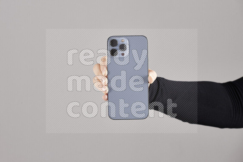 Woman hands holding different mobile phones in different positions