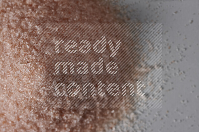 A bunch of fine himalayan salt on white background