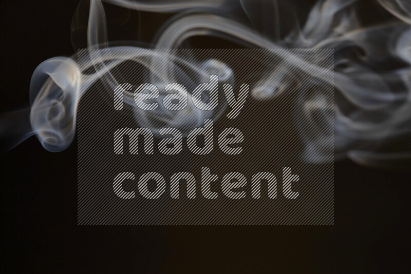 Motion of wavy smoke isolated on dark background