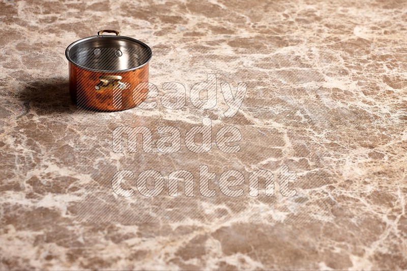 Small Copper Pot on Beige Marble Flooring, 45 degrees