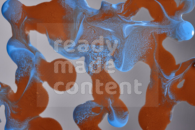 Abstract colorful background with mixed of orange and blue paint colors