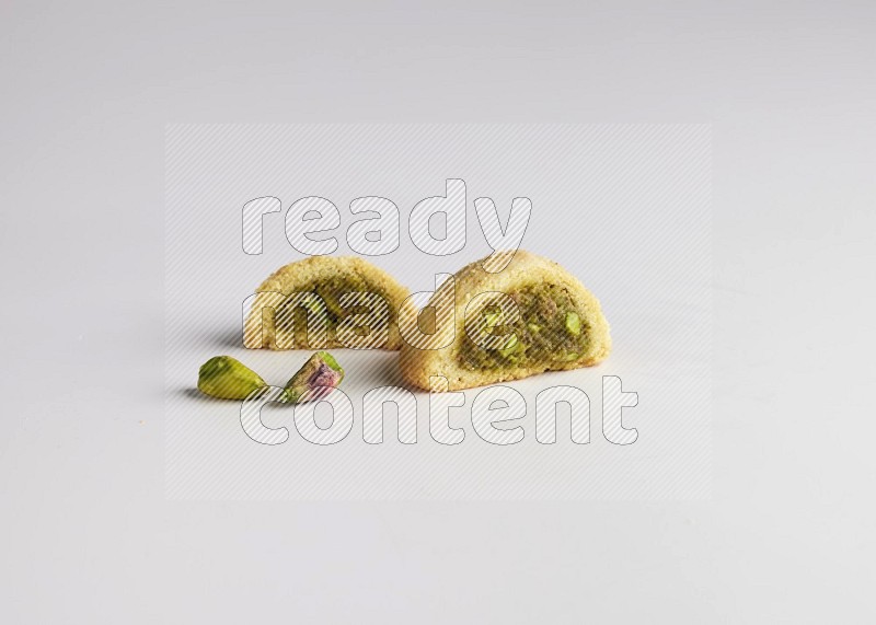 Half Maamoul filled with pistachio direct on white background