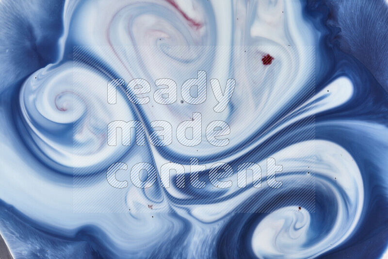 لقطة مقربة لأنماط دوامية باللون الأزرق والأحمر والأبيض