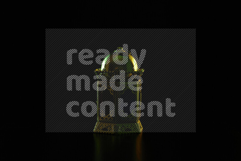 Ramadan lanterns with colored rim light against black background