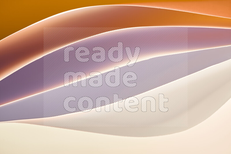 This image showcases an abstract paper art composition with paper curves in white and different warm gradients created by colored light