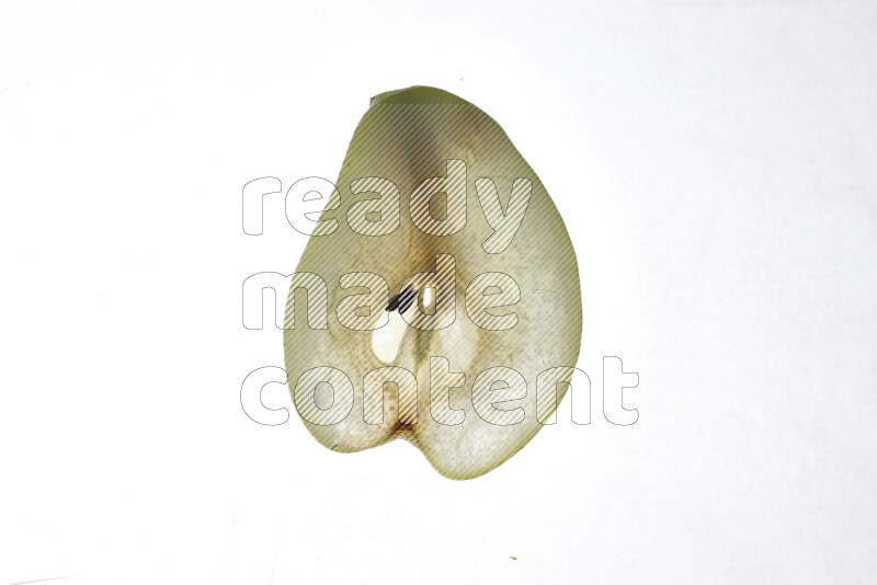 Pear slices on illuminated white background