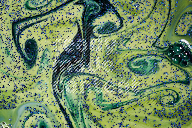 لقطة مقربة لبريق أزرق متلألئ منتشر على خلفية من اللون الأزرق والأخضر في حركات دائرية