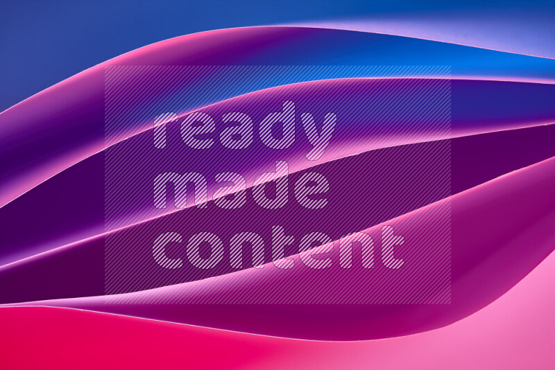 This image showcases an abstract paper art composition with paper curves in blue, purple and red gradients created by colored light