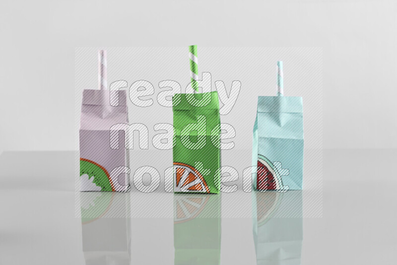 Origami juice box on grey background
