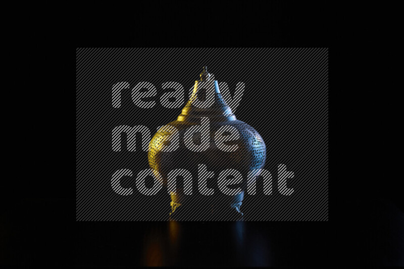 Ramadan lanterns with colored rim light against black background