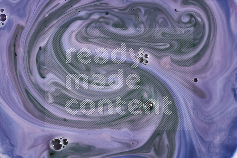 A close-up of abstract swirling patterns in blue, pink and green