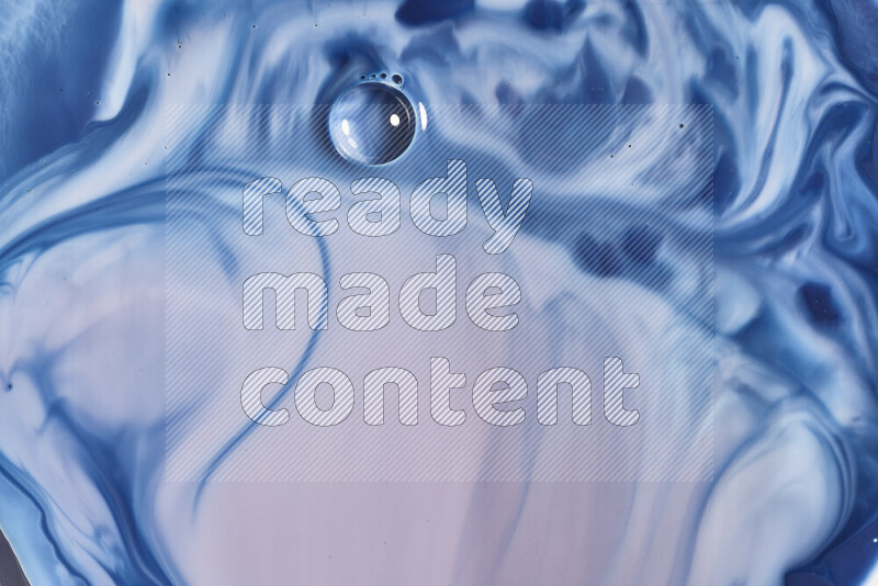 لقطة مقربة لأنماط دوامية باللون الأزرق والأحمر والأبيض