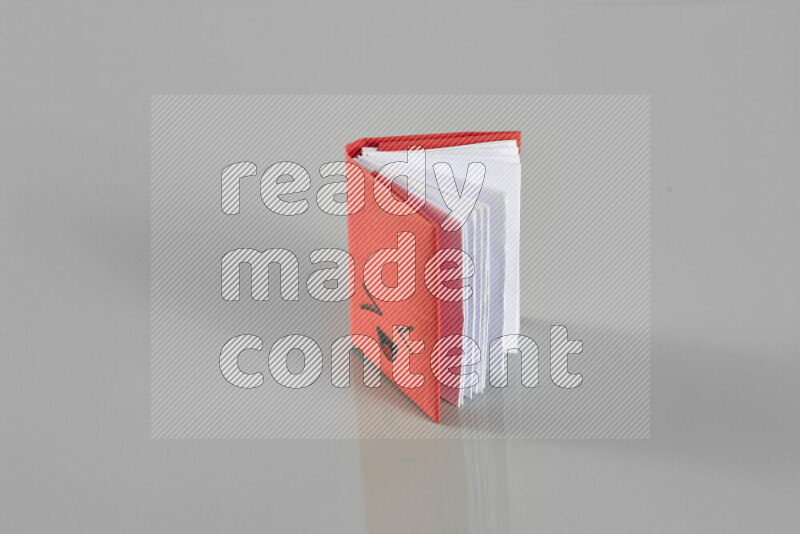 Origami book on grey background