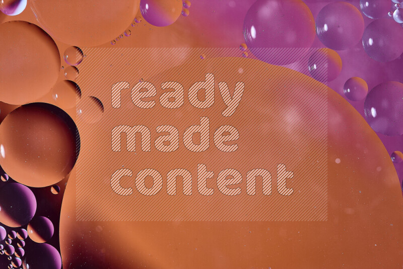 Close-ups of abstract oil bubbles on water surface in shades of orange and pink