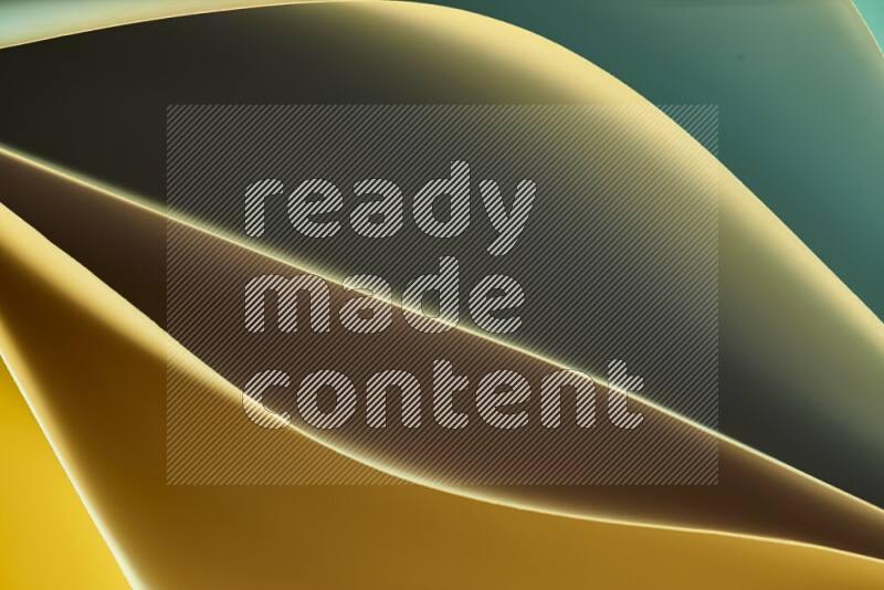 This image showcases an abstract paper art composition with paper curves in green and yellow gradients created by colored light