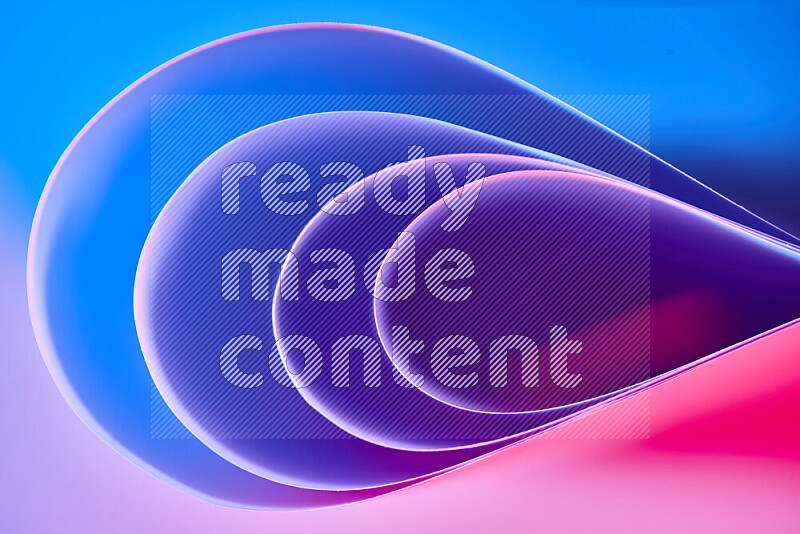 An abstract art of paper folded into smooth curves in blue, purple and red gradients