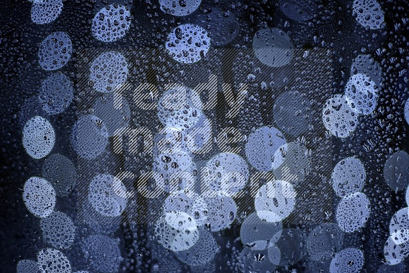 Bokeh light in white with water drops