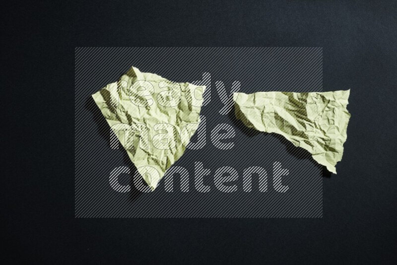 Yellow paper sheet on black background