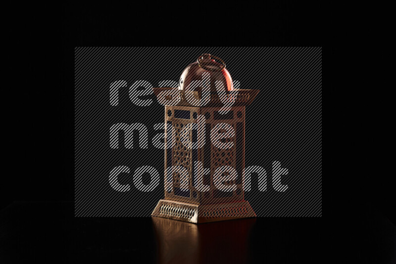 Ramadan lanterns with colored rim light against black background