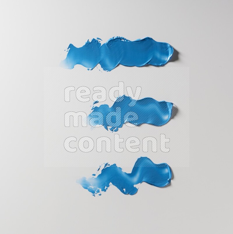 Blue zigzag painting knife strokes on white background