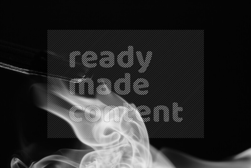 Motion of wavy smoke isolated on dark background