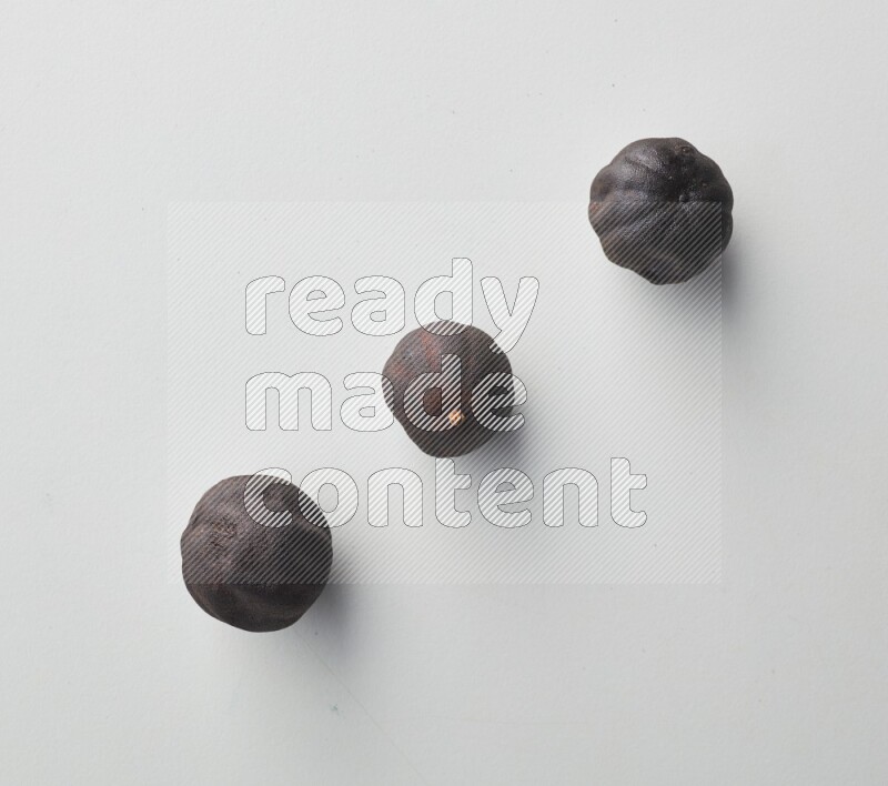 Top-view shot of dried lime (loomi) on white background
