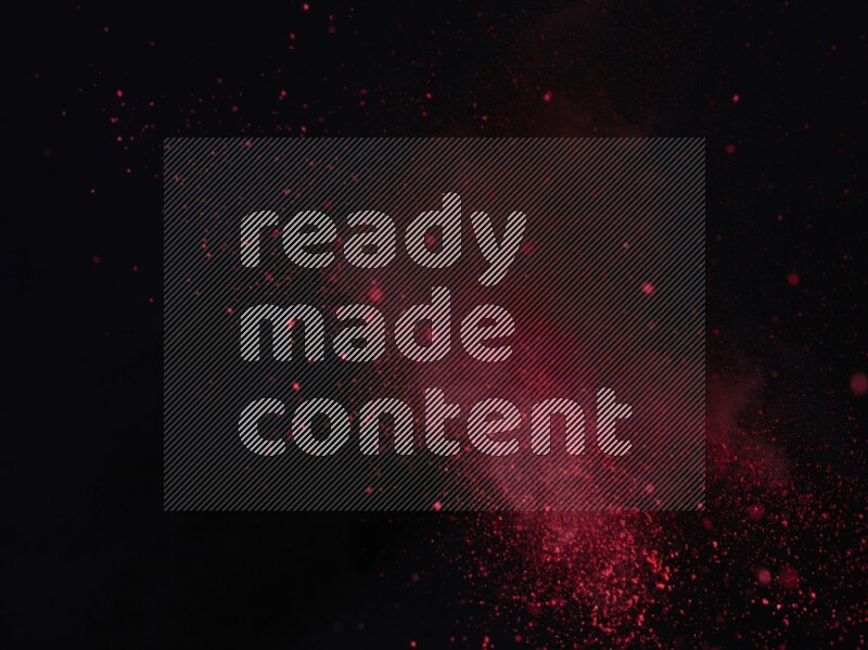 Red powder explosion on black background