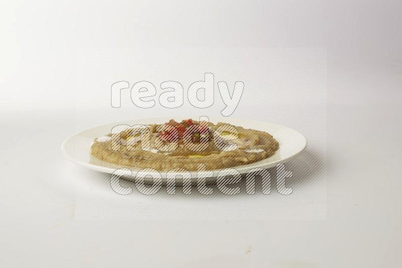 fava bean in a white plate direct on a white background