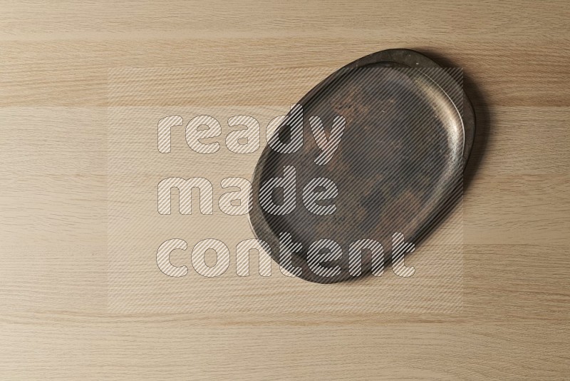 Top View Shot Of A Vintage Metal Tray on Oak Wooden Flooring