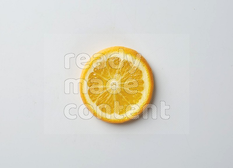A Single orange slice on white background