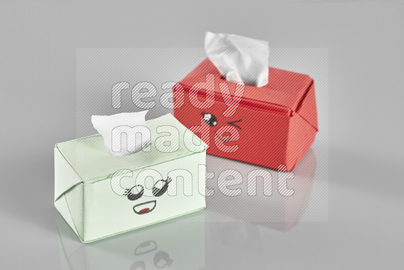 Origami tissue box on grey background