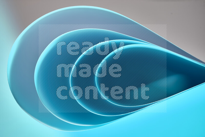 فن تجريدي لورق مطوي على شكل منحنيات ناعمة بتدرجات اللون الأزرق