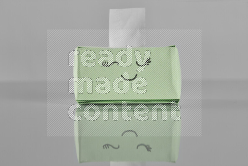 Origami tissue box on grey background