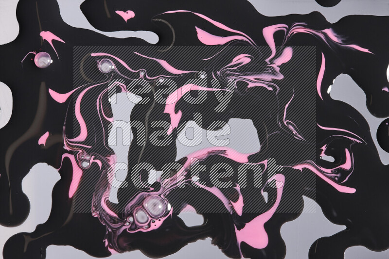 Abstract colorful background with mixed of pink and black paint colors