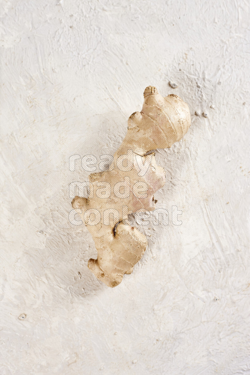 Fresh ginger root on white background