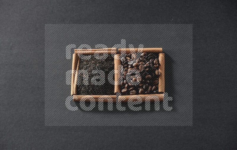 2 squares of cinnamon sticks full of coffee beans and tea on black flooring
