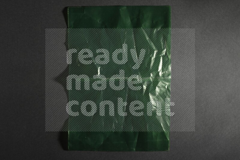 Colored plastic textures on black background