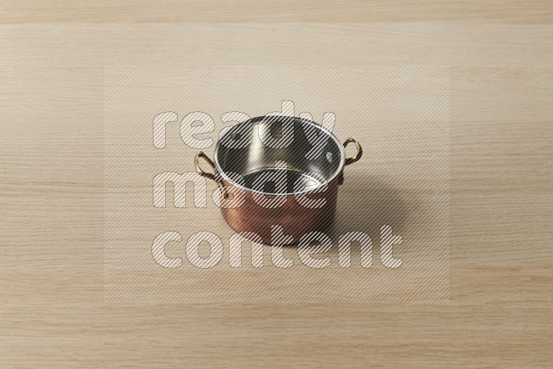 Small Copper Pot on Oak Wooden Flooring, 45 degrees