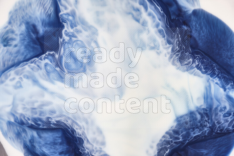 لقطة مقربة لأنماط دوامية باللون الأزرق والأبيض