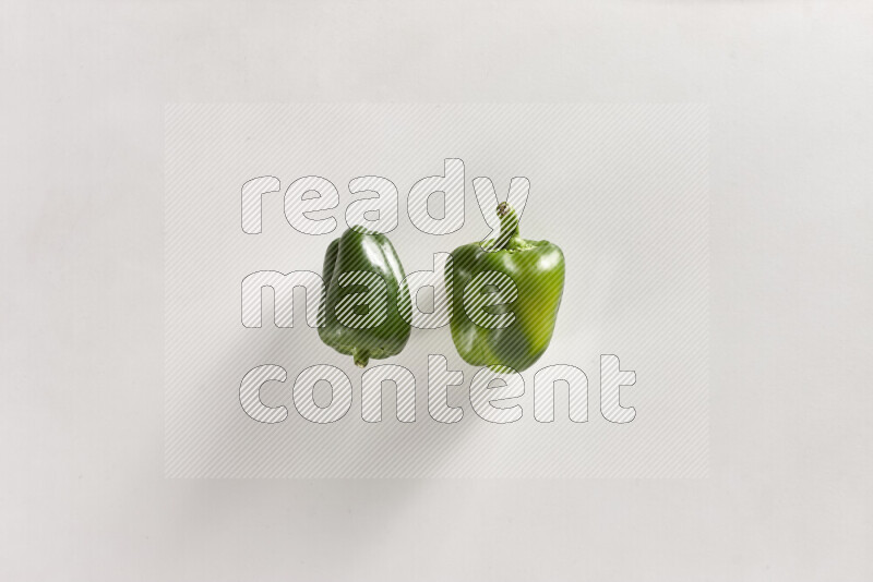 Green bell pepper on white background