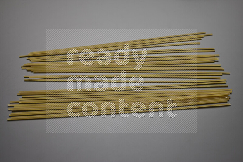 Spaghetti pasta on grey background