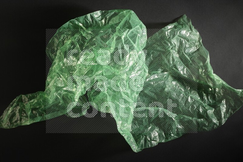 Colored plastic textures on black background