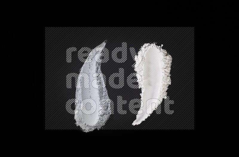 Multicolored powder strokes on black background