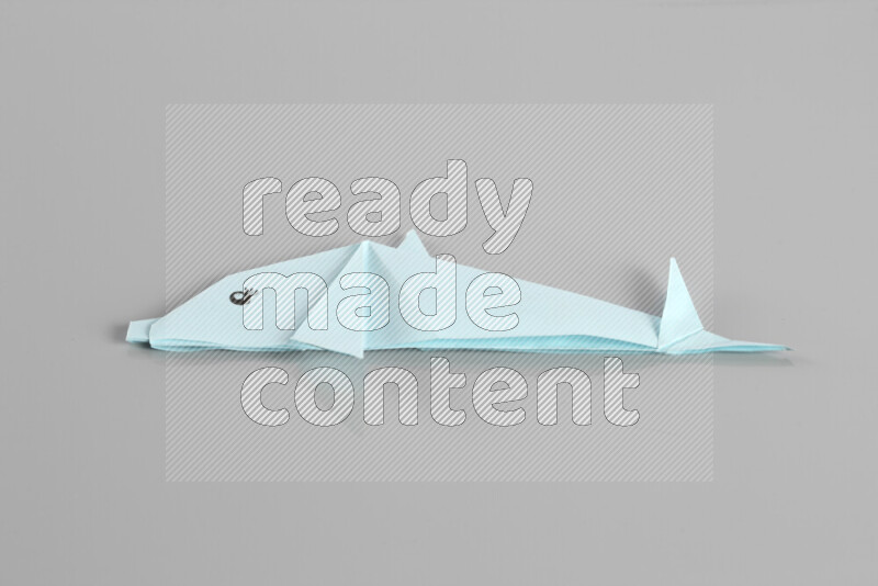 Origami animals on grey background