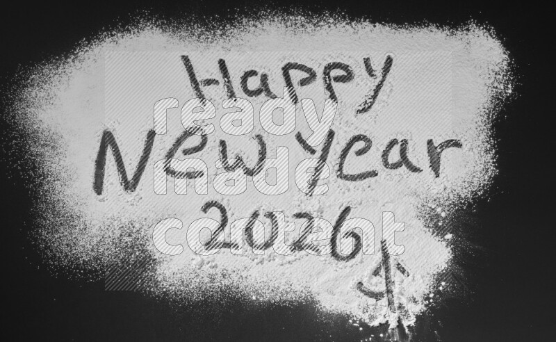 A sentence written with powder on black background