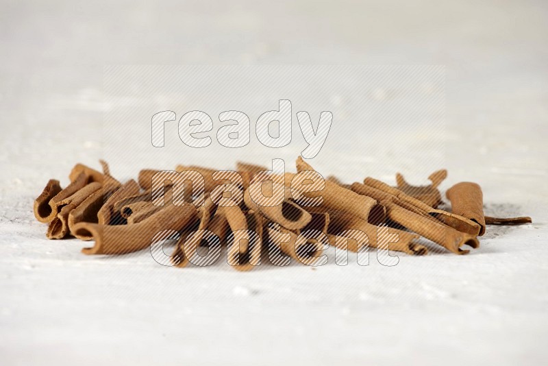 Cinnamon sticks in different angles on white background
