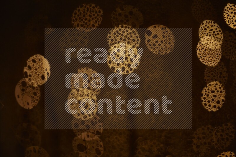 Bokeh light in yellow with water drops