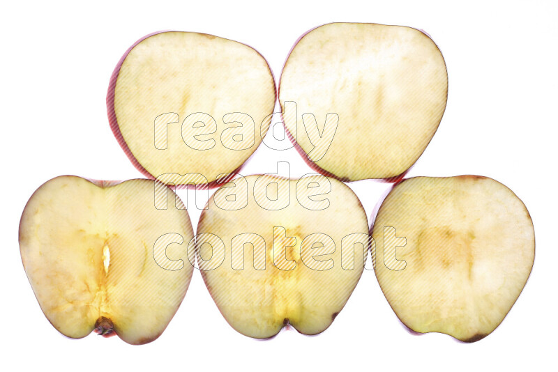 Apple slices on illuminated white background